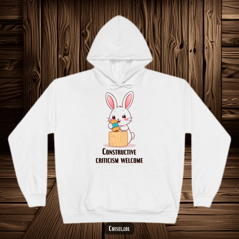 Funny Kawaii bunny hoodie showing a cute character with a miniature hammer tapping a toy block, ideal for a humorous present.