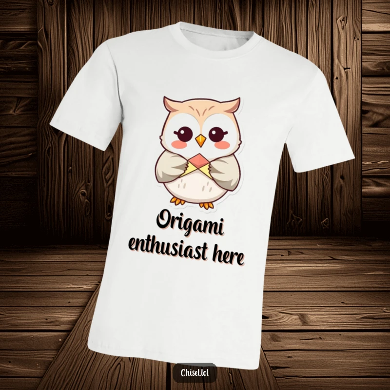 Funny Kawaii Owl T-Shirt: A giggling owl meticulously folding a colorful origami shape, celebrating creativity and fun.